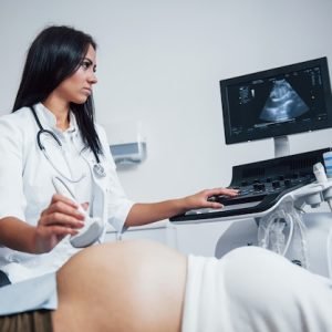female-doctor-does-ultrasound-pregnant-woman-hospital_146671-26470 Best Infertility Treatment Doctors In Patna